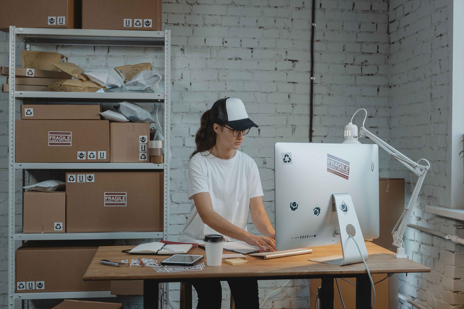 Online retail orders and product catalog on a laptop